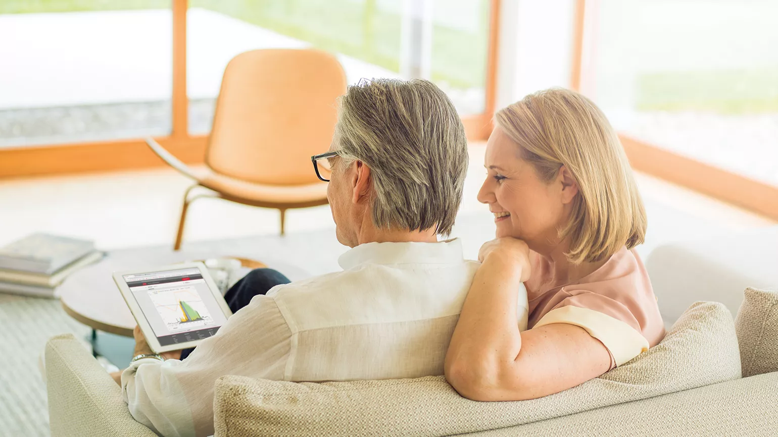 couple monitoring on a tablet